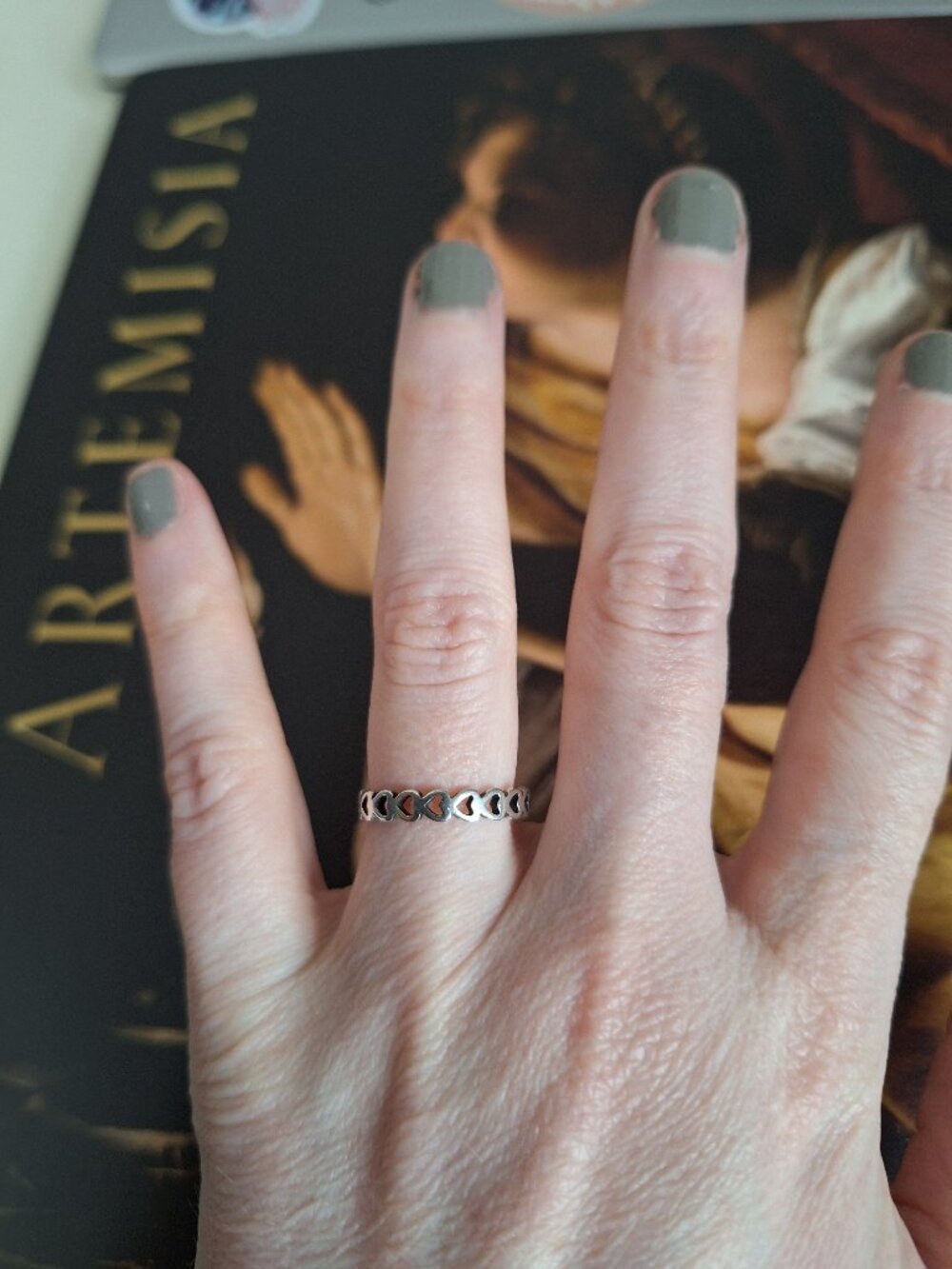 Silver tone hearts ring